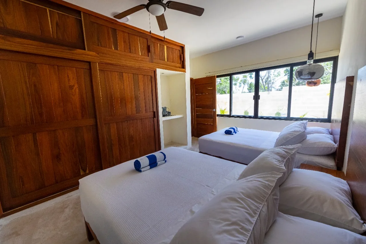 The Family Room, with two double beds and built-in wooden wardrobes